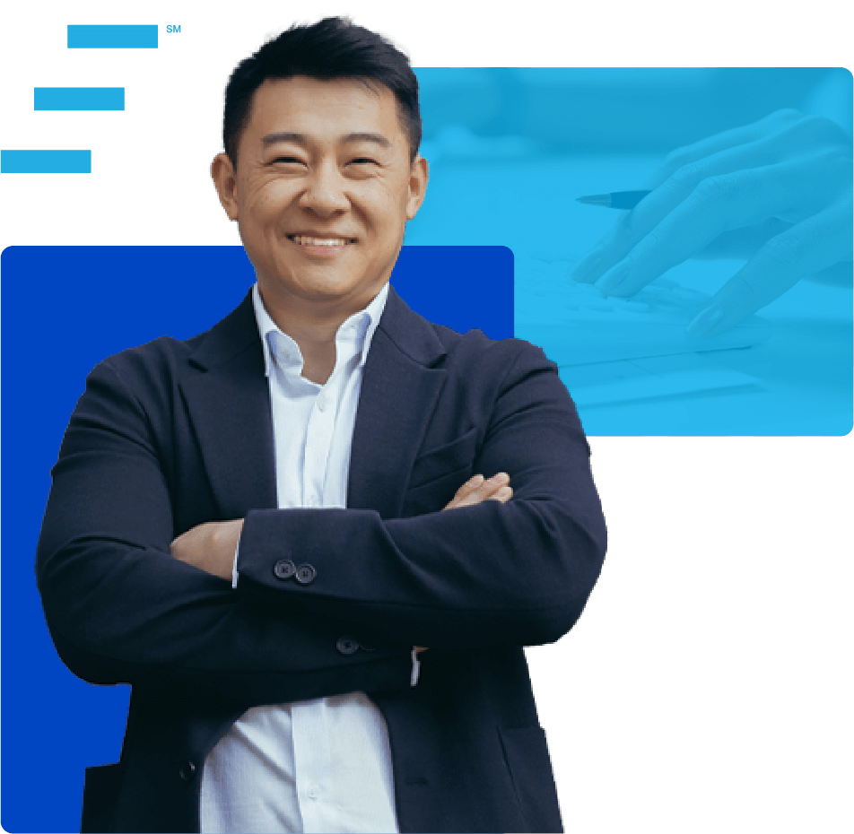 Asian male with arms crossed in suit