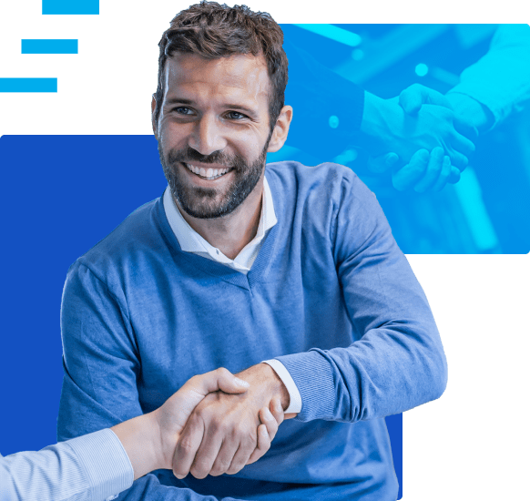 Man smiling and shaking hand