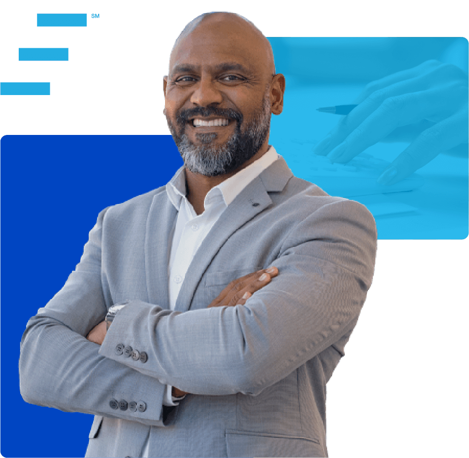 Mature male in suit with smile and arms crossed